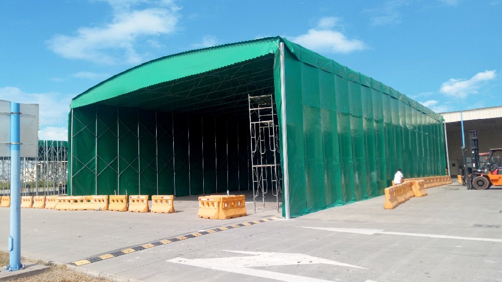 手動大型倉庫推(tuī)拉雨棚